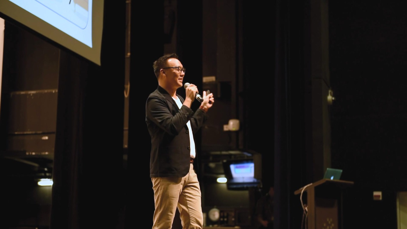 Mac Ling speaking on stage